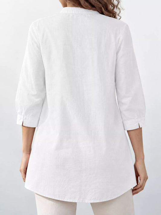 Marigold Collections Australia half button pocketed 3/4 sleeve blouse with front pockets and subtle button details.