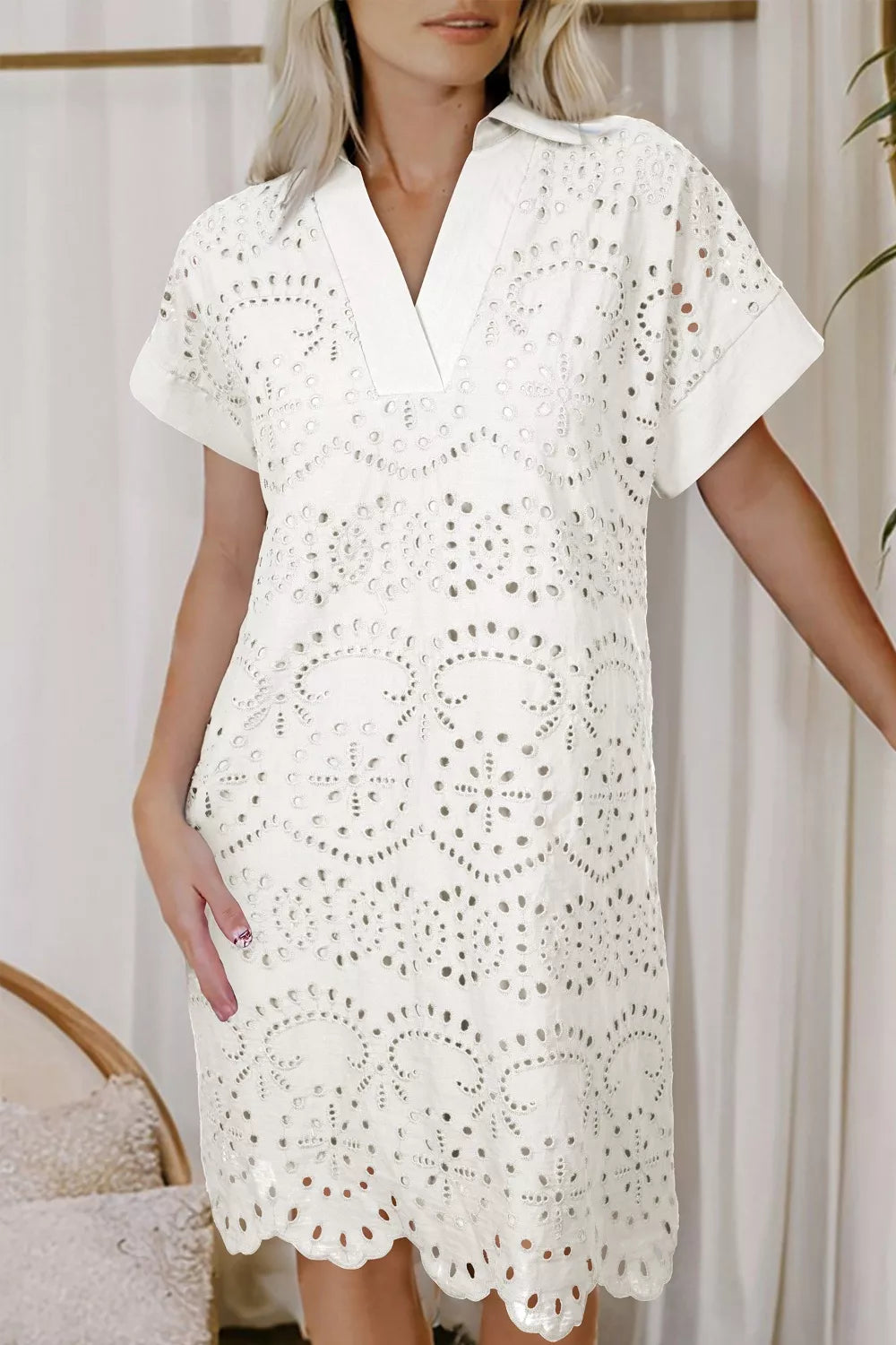 White eyelet collared mini dress from Marigold Collections Australia, featuring a classic collar and intricate eyelet detailing.