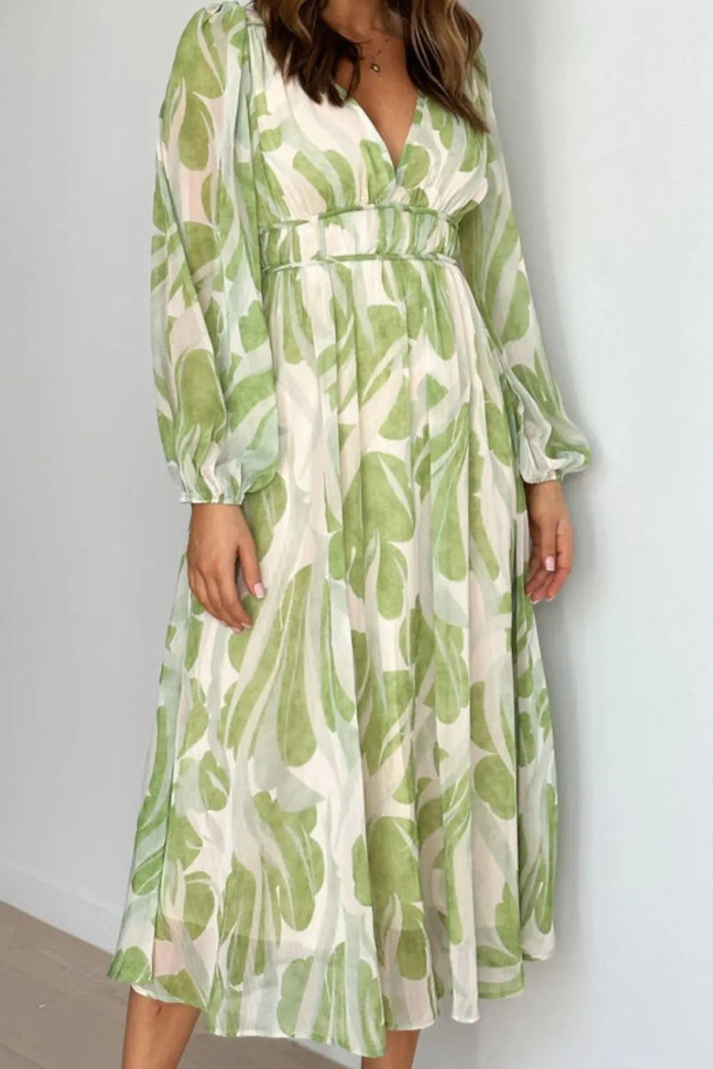 Light green floral midi dress by Marigold Collections Australia featuring long sleeves, chiffon fabric, and a V-neck for women.