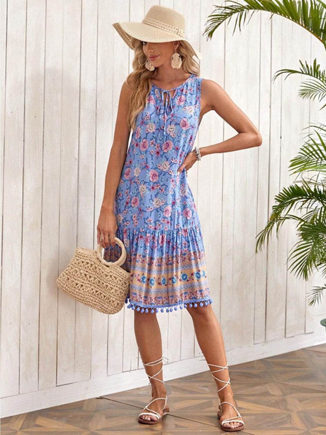Floral Print Blue Sleeveless Dress with Tie Neck & Pom-Pom Hem - MARIGOLD