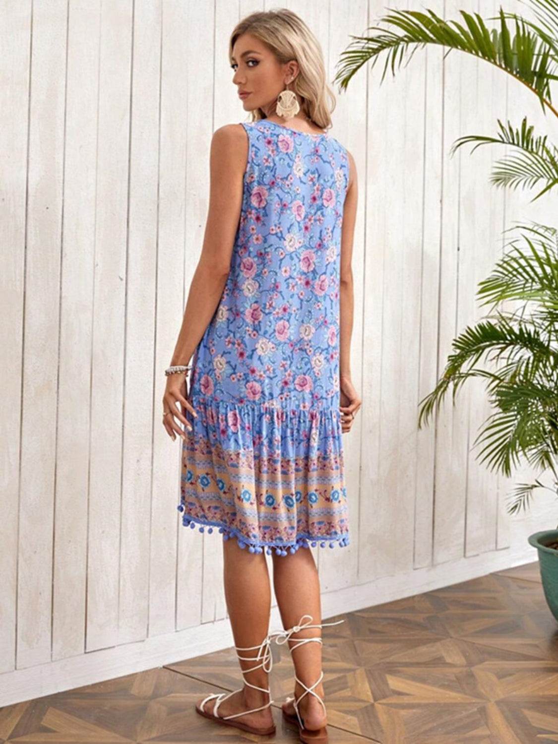 Floral Print Blue Sleeveless Dress with Tie Neck & Pom-Pom Hem - MARIGOLD