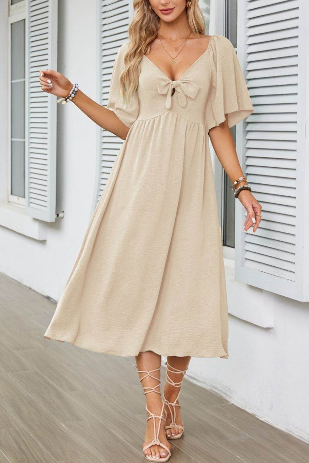 Elegant Midi Dress with Bow Tie Front and Flutter Sleeves - MARIGOLD