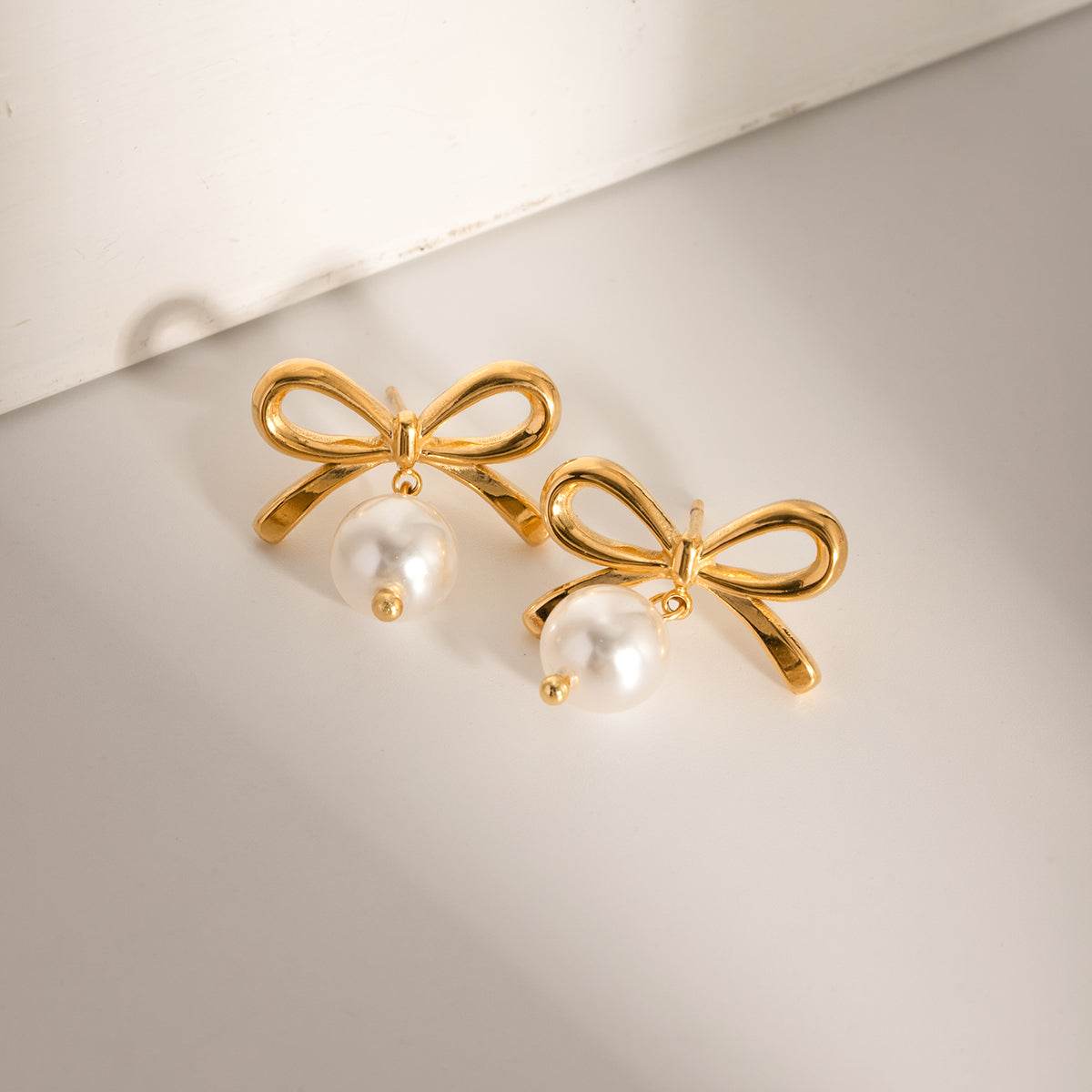 Elegant Bow Faux Pearl Stainless Steel Earrings - MARIGOLD