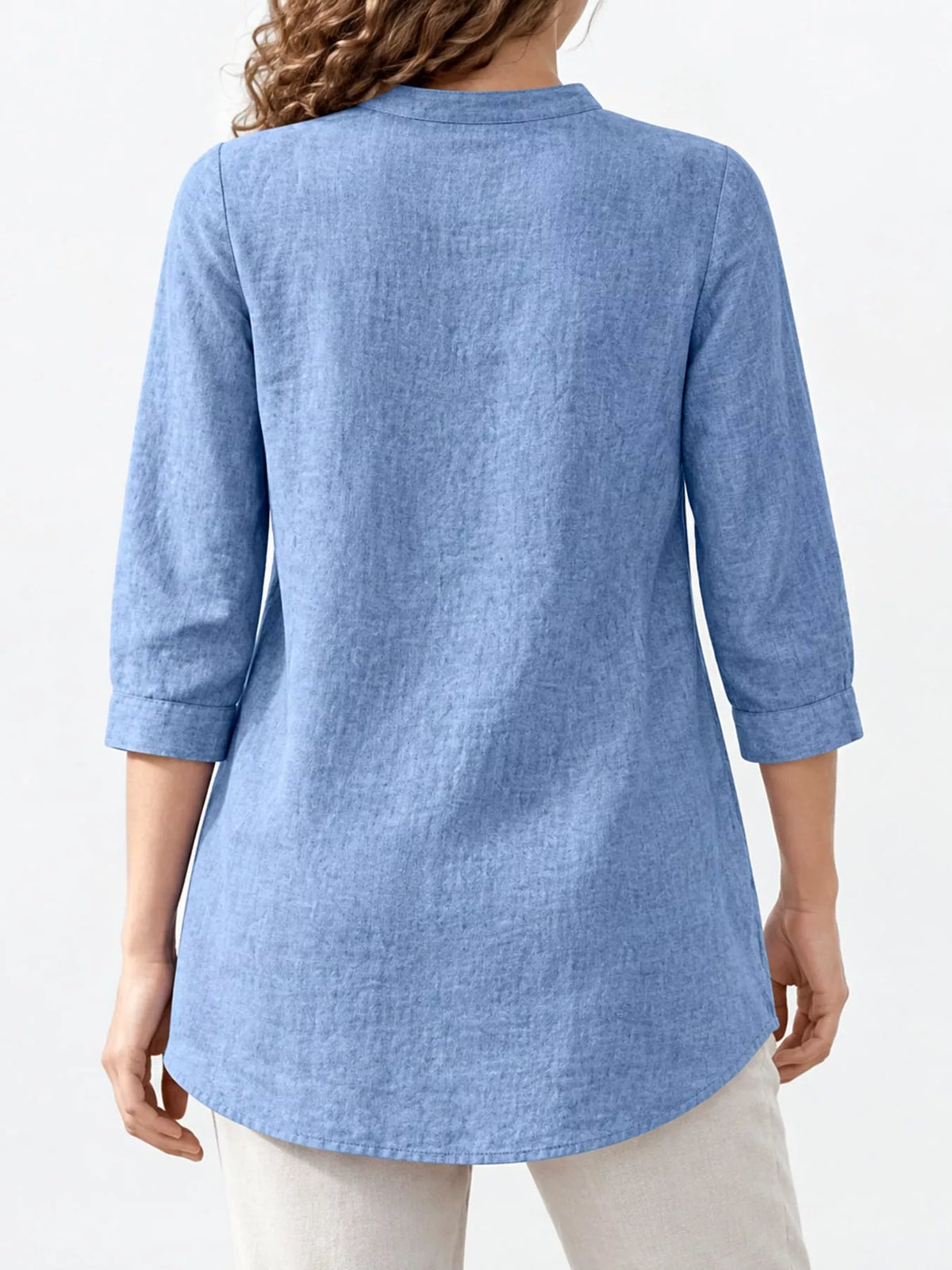 Marigold Collections Australia half button pocketed 3/4 sleeve blouse with a relaxed fit and subtle front pocket detail.