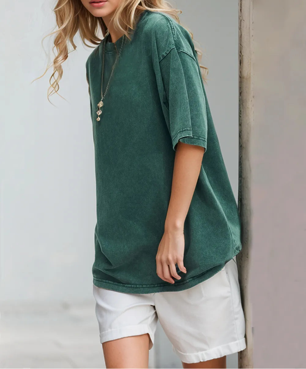 Marigold Collections Australia vintage-look cotton T-shirt with a relaxed fit and retro-inspired design, displayed on a hanger.