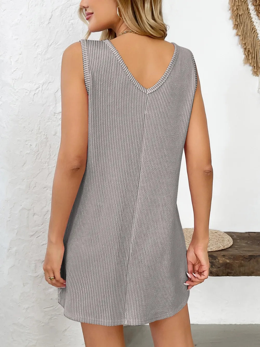 Marigold Collections Australia pocketed sleeveless mini shift dress in a relaxed silhouette