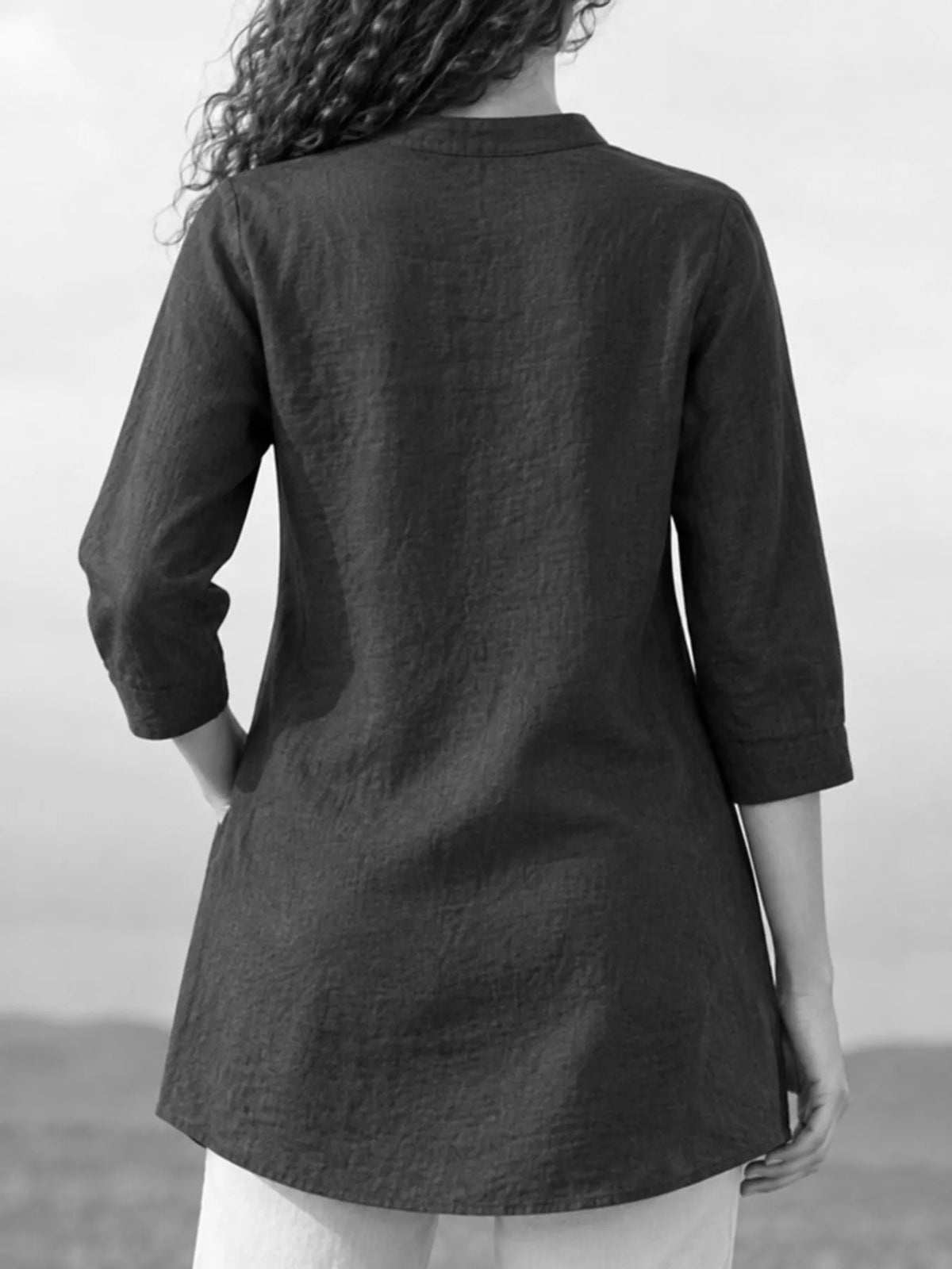 Marigold Collections Australia half button pocketed 3/4 sleeve blouse with a relaxed fit and soft fabric, ideal for casual wear.