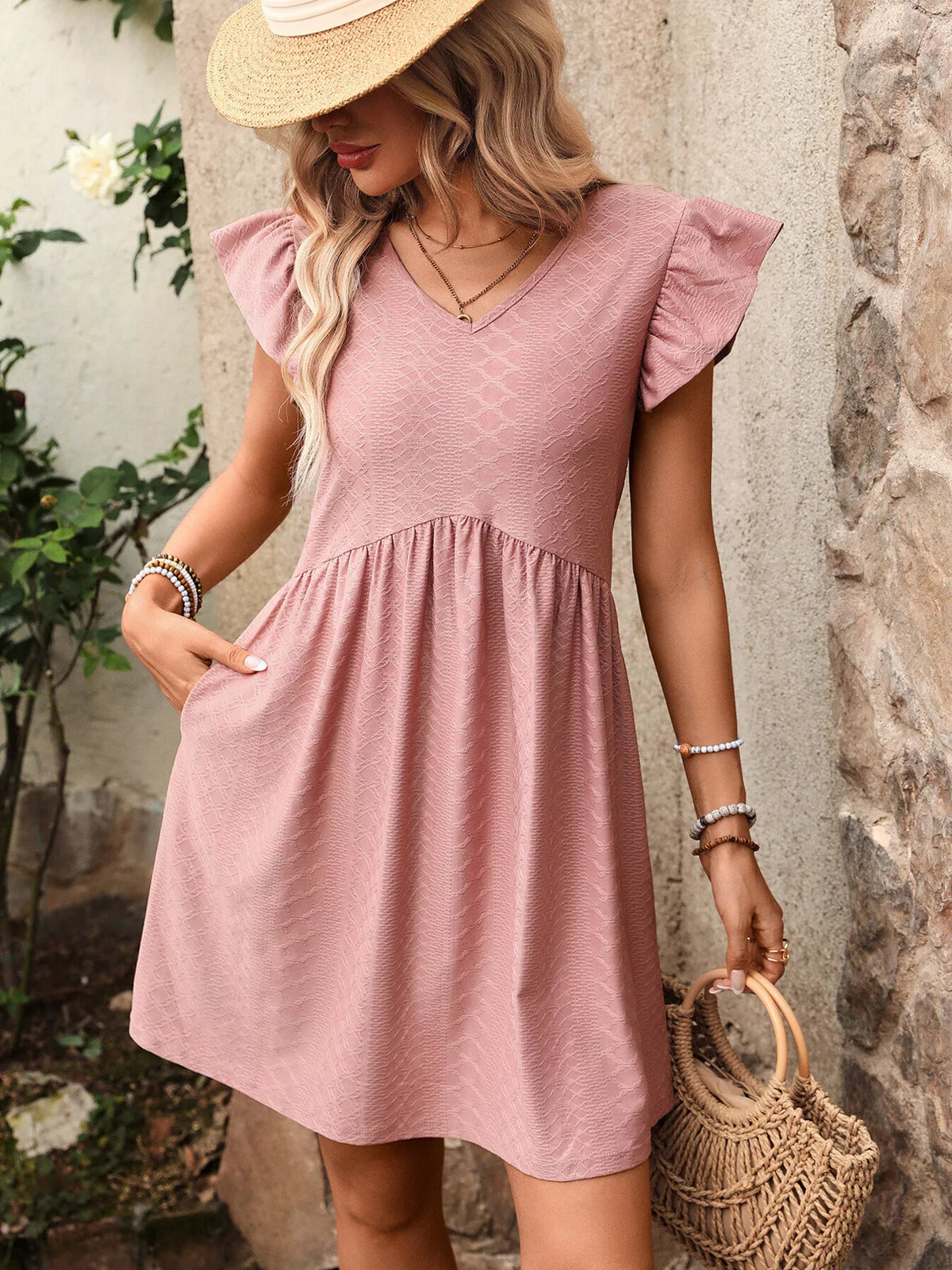 Marigold Collections Australia ruffle sleeve V-neck A-line mini dress, stylish and flowy, displayed on a model in a bright outdoor setting.