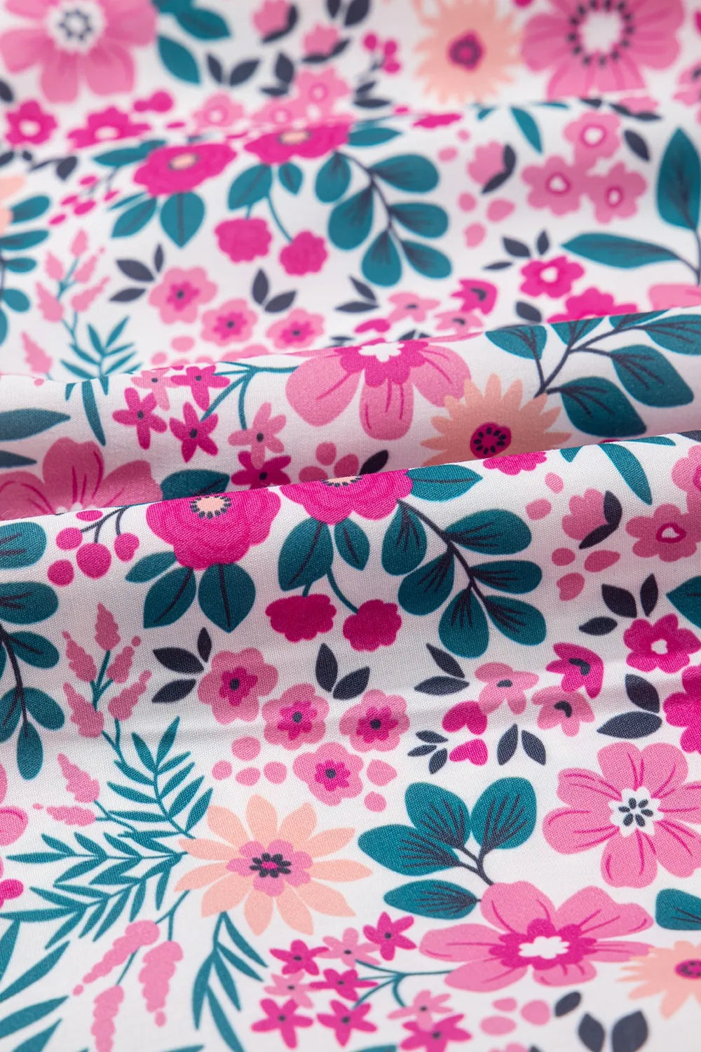 Floral short sleeve mini shirt dress by Marigold Collections Australia, lightweight fabric with a vibrant floral pattern and collar detail.