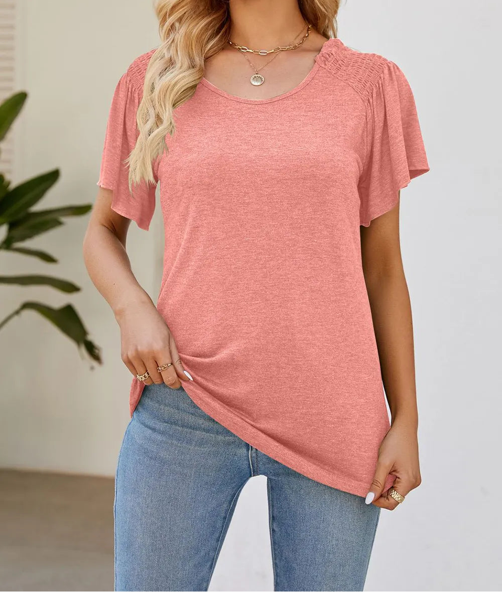 Marigold Collections Australia smocked shoulder flutter sleeve top in soft fabric, featuring feminine design and delicate details.