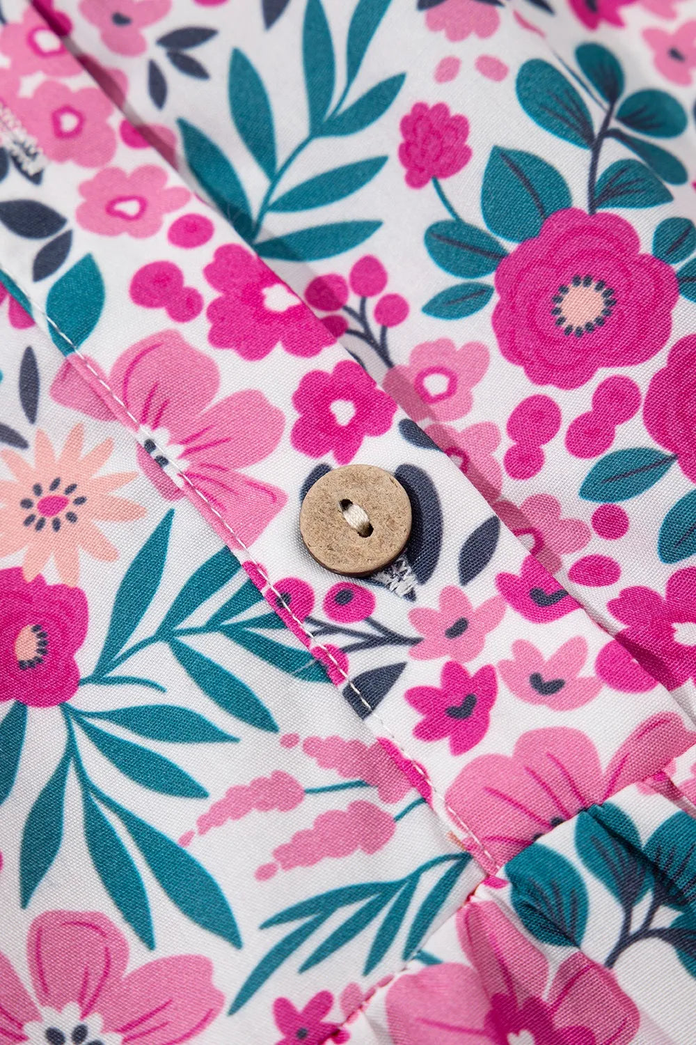 Floral short sleeve mini shirt dress by Marigold Collections Australia featuring a vibrant floral pattern and a classic collar.