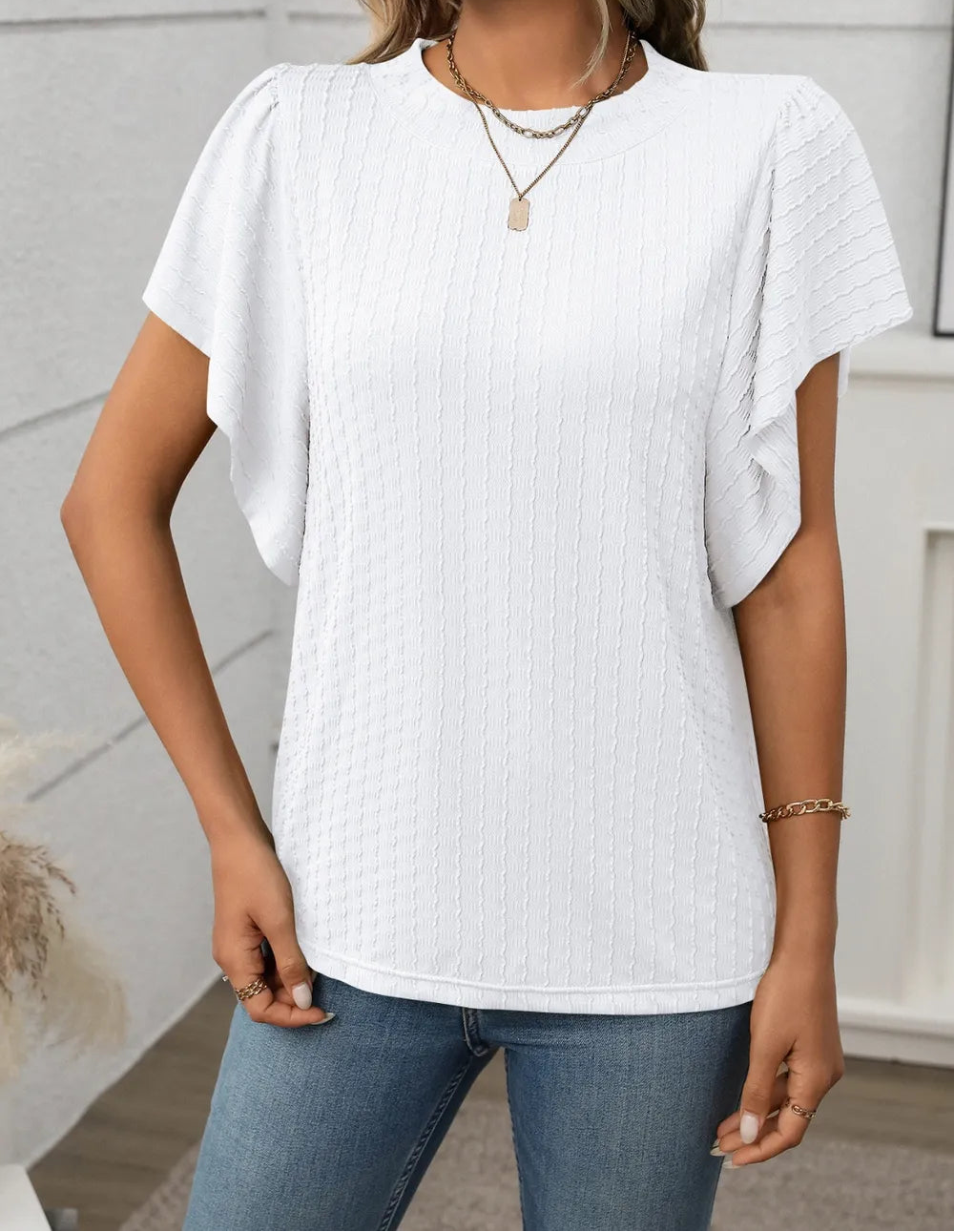 Marigold Collections Australia round neck flutter sleeve top in soft fabric, showcasing a stylish blouse with feminine flutter sleeves.