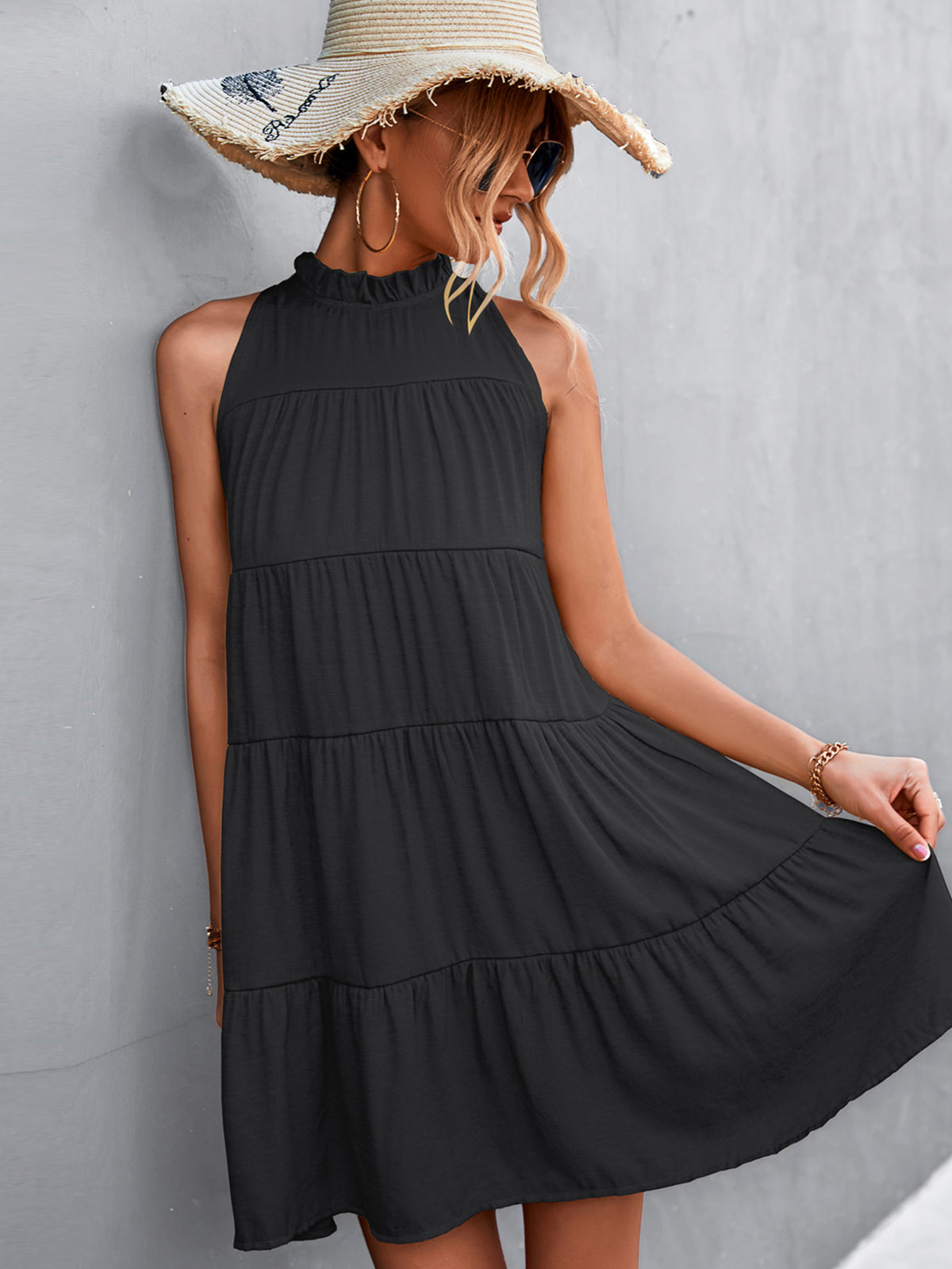 Marigold Collections Australia high-neck sleeveless tiered mini dress with back tie, showcasing stylish, layered fabric design.
