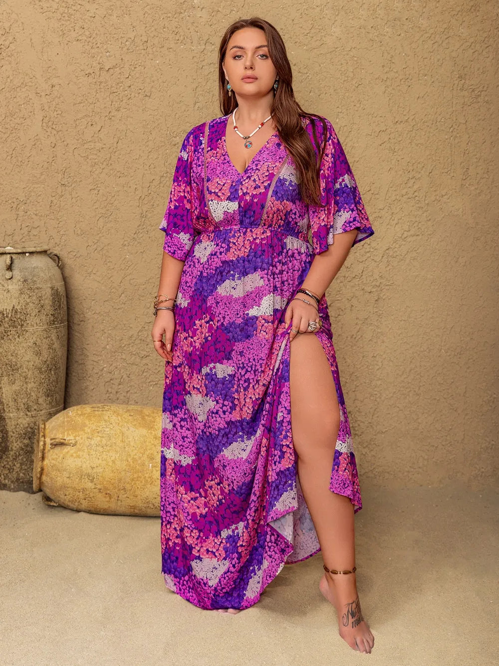 Vivid violet boho floral maxi dress by Marigold Collections Australia, flowing design with vibrant floral pattern, perfect for bohemian style.