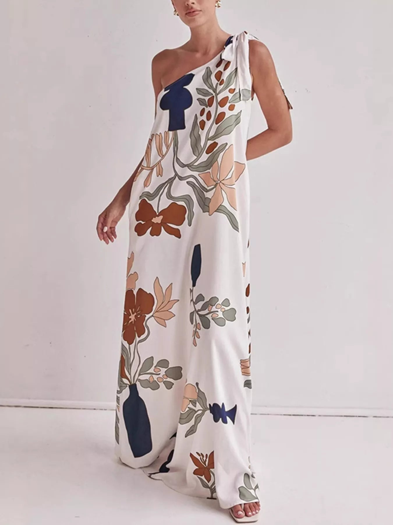Elegant floral print one-shoulder maxi dress by Marigold Collections Australia, designed for tall women, showcased on a model.