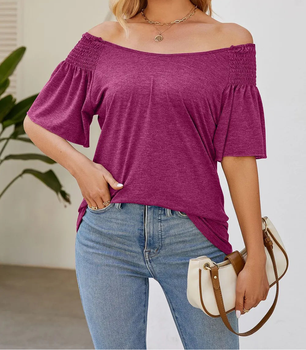 Marigold Collections Australia smocked shoulder flutter sleeve top featuring lightweight fabric and feminine design.