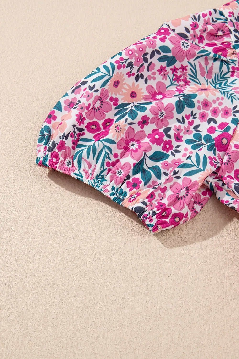 Floral short sleeve mini shirt dress by Marigold Collections Australia with a vibrant floral pattern and button front.