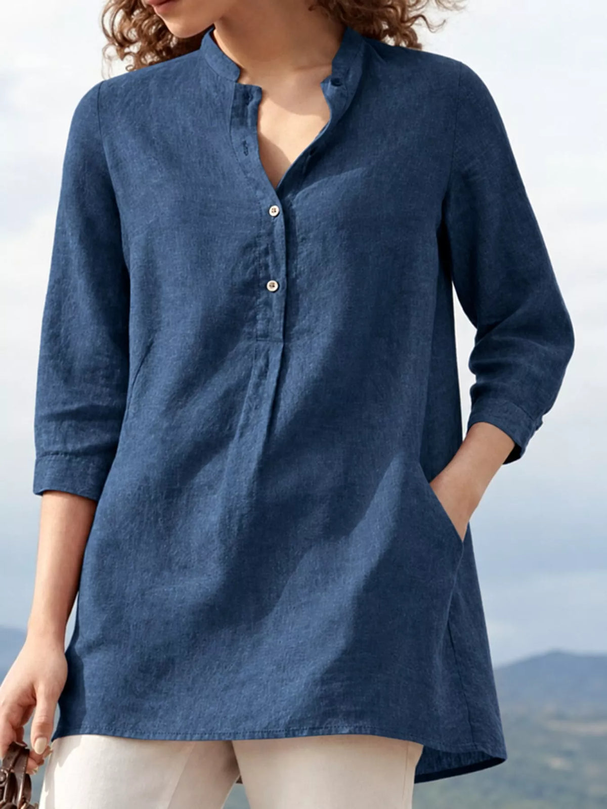Marigold Collections Australia half button pocketed 3/4 sleeve blouse with a relaxed fit and subtle details in soft fabric.