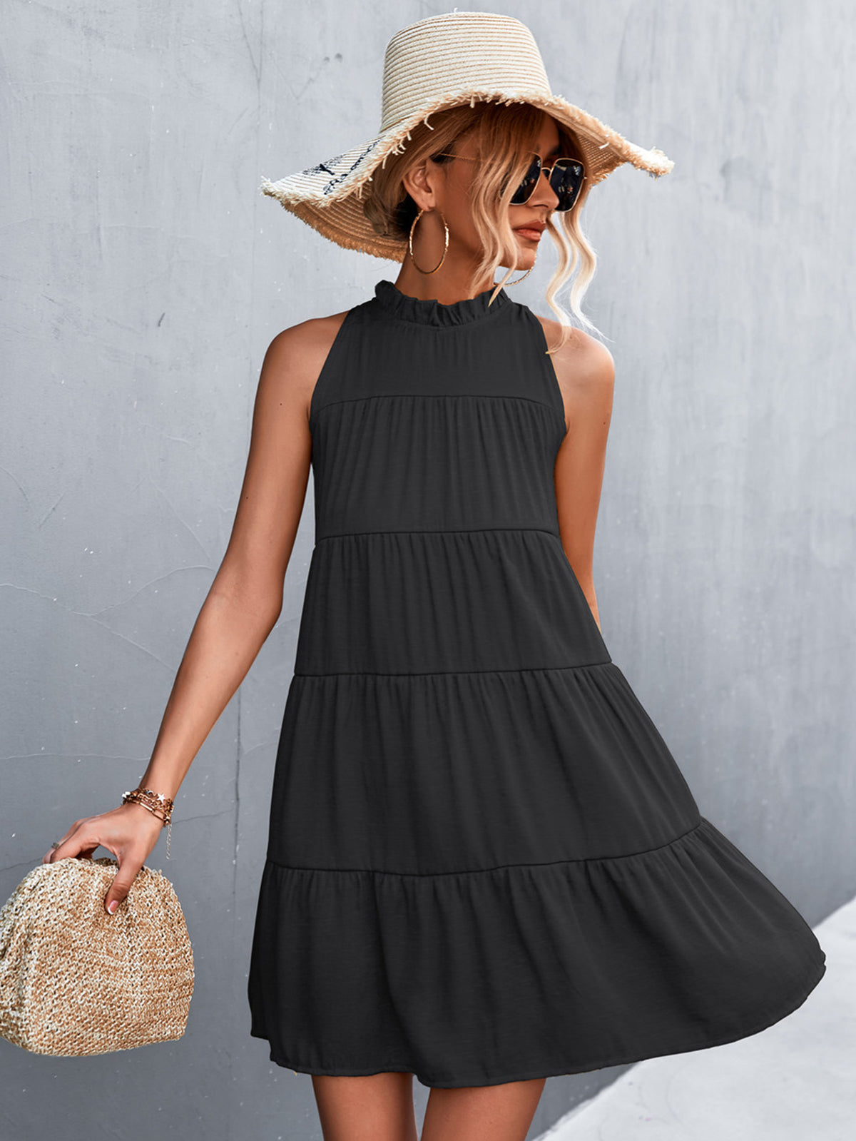 Marigold Collections Australia sleeveless high-neck back-tie tiered mini dress, featuring a flowy tiered design and stylish neckline.