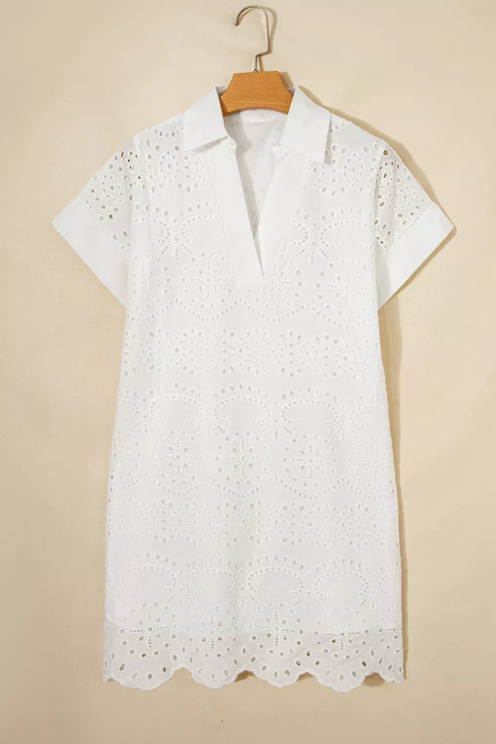 White eyelet collared mini dress by Marigold Collections Australia, featuring a classic collar and feminine eyelet details