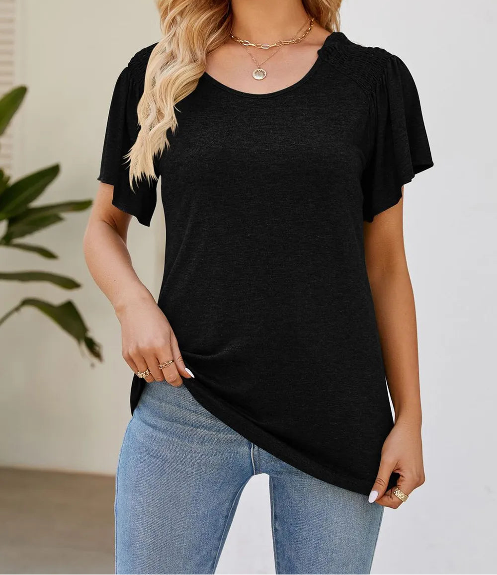 Marigold Collections Australia smocked shoulder flutter sleeve top in soft fabric, featuring a stylish, feminine design.