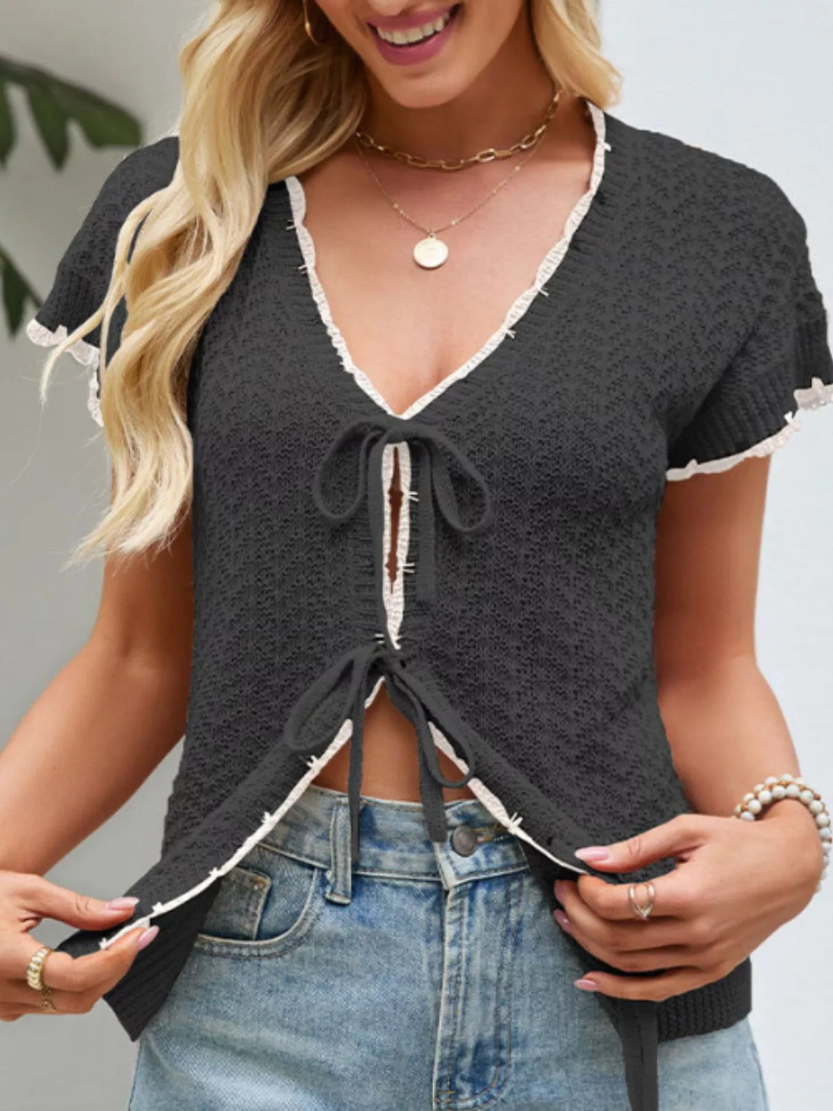 Marigold Collections Australia tie-front knit short sleeve cardigan in a soft, textured design