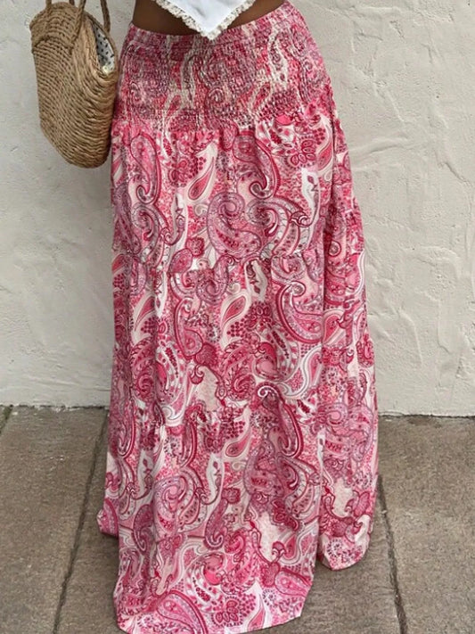Boho paisley print tiered maxi skirt by Marigold Collections Australia, flowing bohemian style with layered tiers and vibrant pattern.