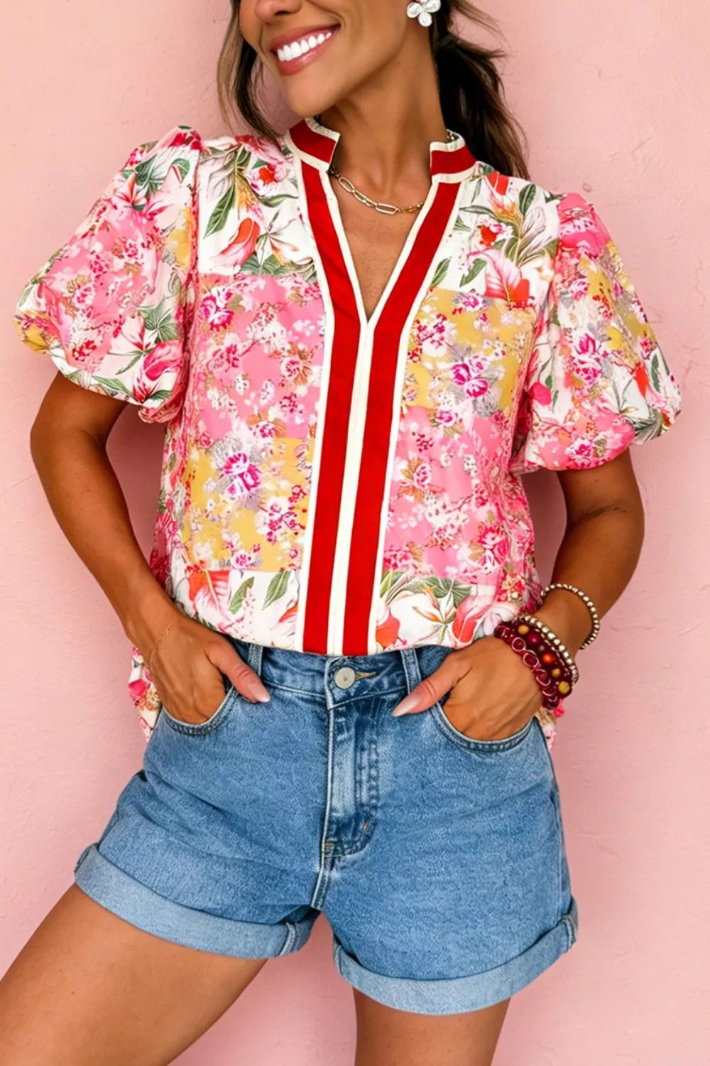 Marigold Collections Australia floral blouse with contrast collar, V-neck, short sleeves, and lightweight fabric.