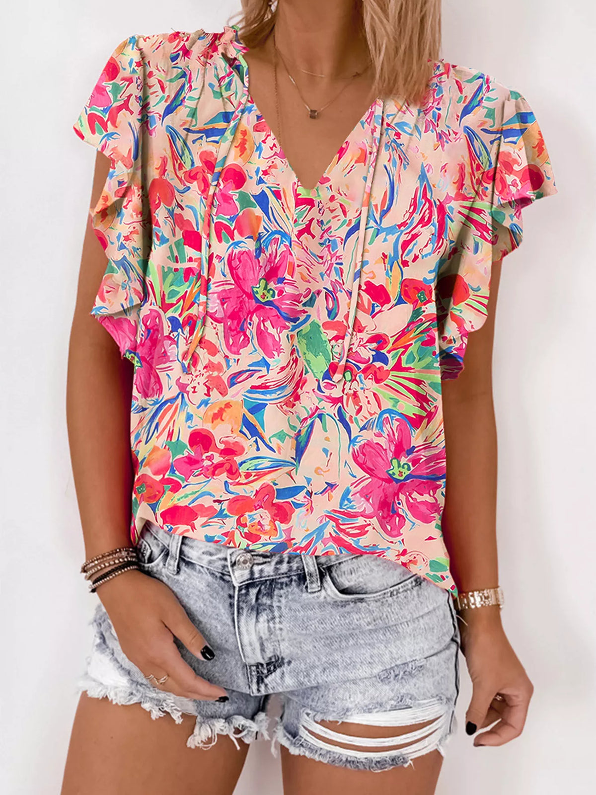 Multicolour floral summer blouse with ruffled sleeves and V-neck from Marigold Collections Australia, casual and stylish top.