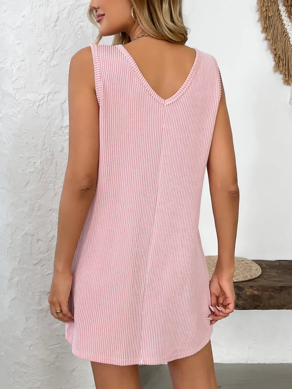 Marigold Collections Australia pocketed sleeveless mini shift dress in a relaxed, simple silhouette