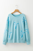 Beau Blue Sequined Bowknot Drop Shoulder Oversized Sweatshirt