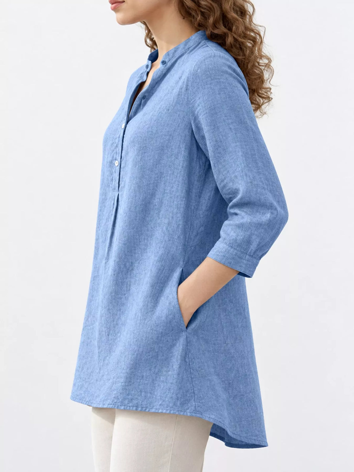 Marigold Collections Australia half-button pocketed 3/4 sleeve blouse, showcasing its stylish design and fabric details.