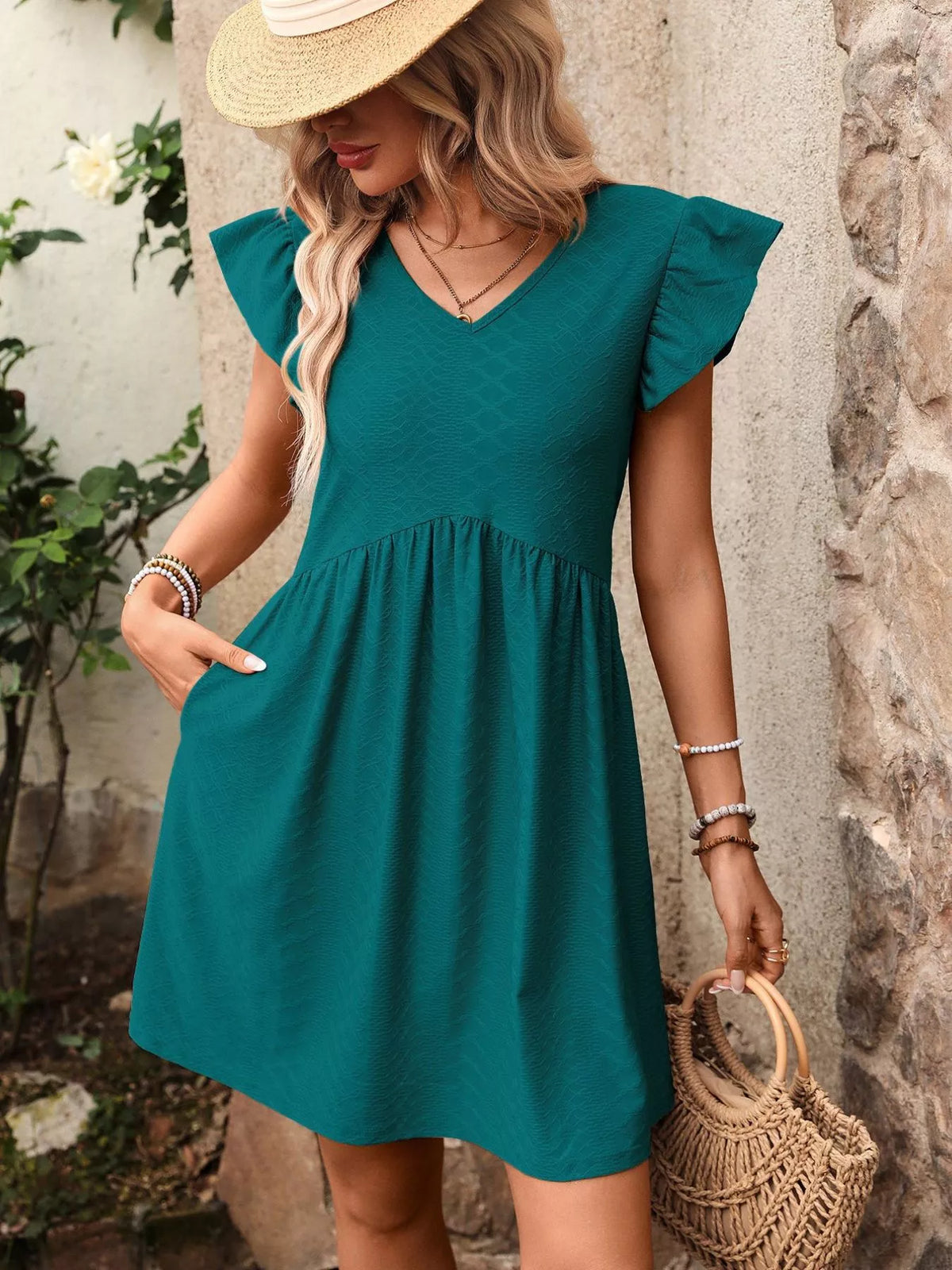 Marigold Collections Australia ruffle sleeve v-neck A-line mini dress with a flowy design and lightweight fabric.
