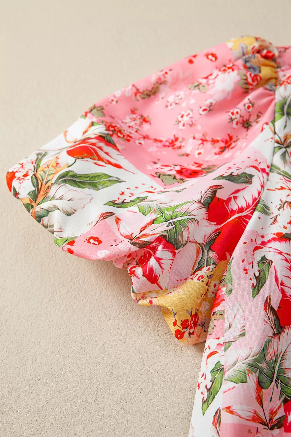 Marigold Collections Australia floral blouse with contrast collar, V neck, short sleeves, and feminine design.