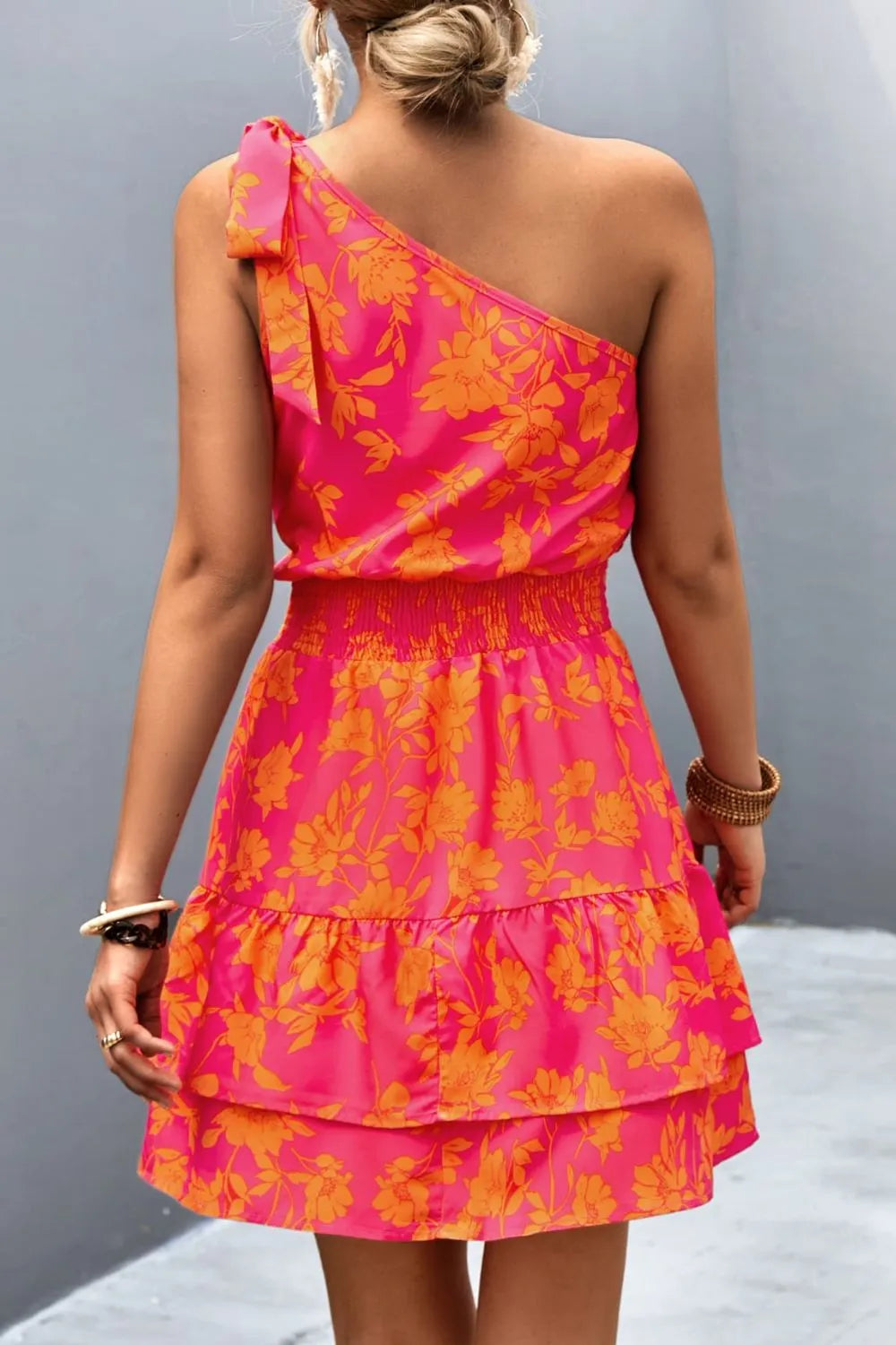 Floral print one-shoulder layered mini dress by Marigold Collections Australia, featuring a stylish design and vibrant floral pattern.