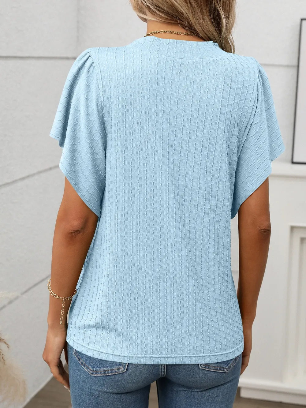 Marigold Collections Australia round neck flutter sleeve top with soft fabric and relaxed fit, stylish and comfortable for casual wear.