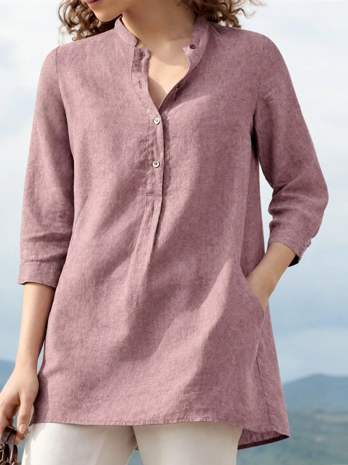 Marigold Collections Australia half button pocketed 3/4 sleeve blouse, shown in a stylish tops and blouses image.