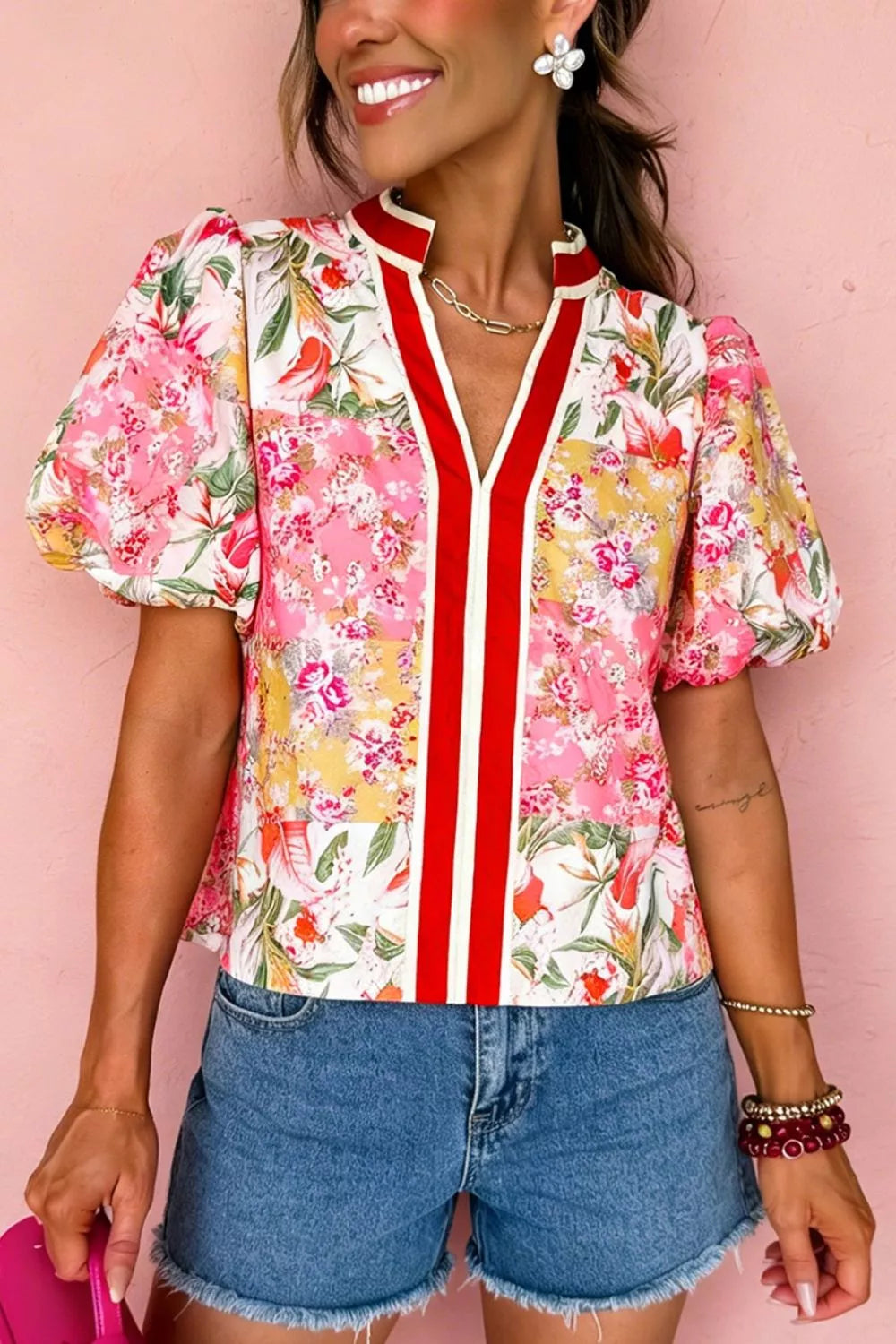 Marigold Collections Australia floral blouse with contrast collar, V-neck, short sleeves, and vibrant floral pattern.